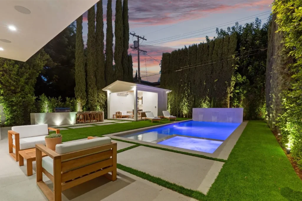 Outdoor area with pool and hardscaping