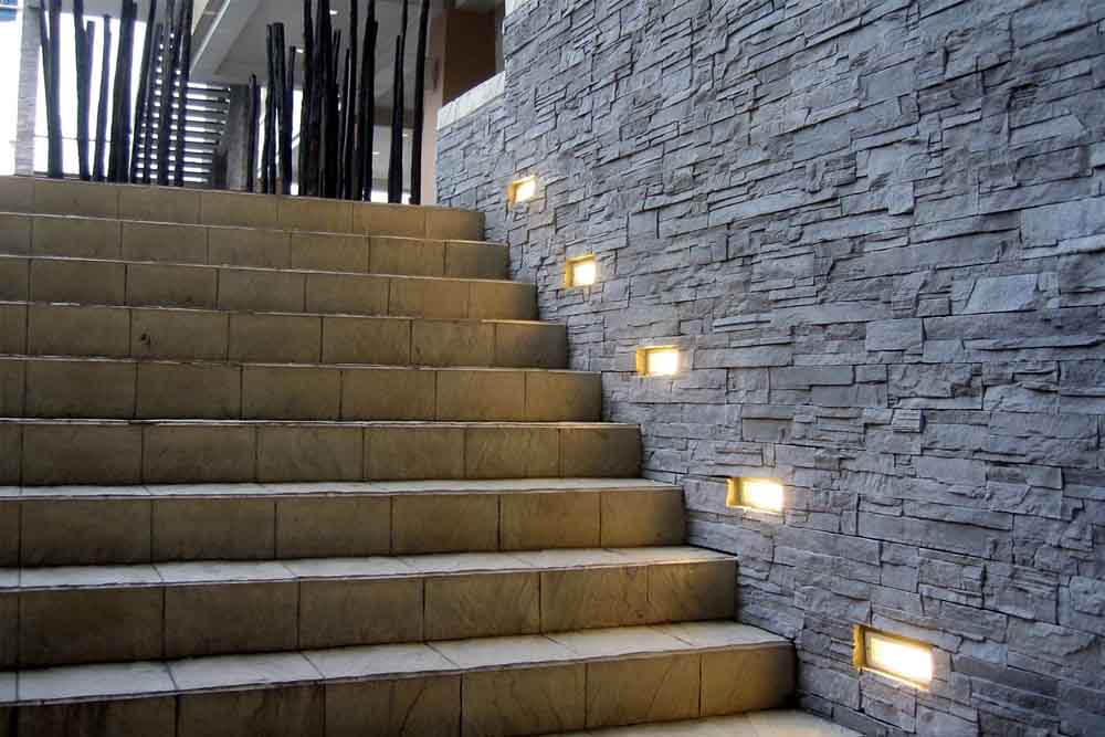 Modern room with recessed lighting highlighting sleek design