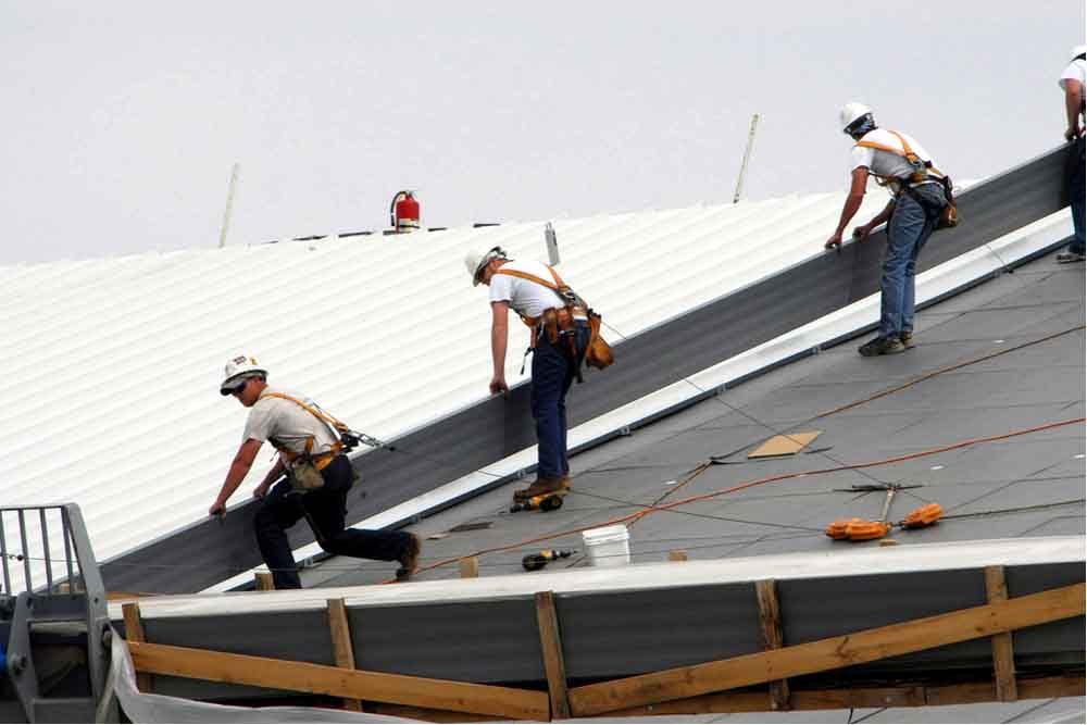 flat roofing contractors installation process in redmond wa
