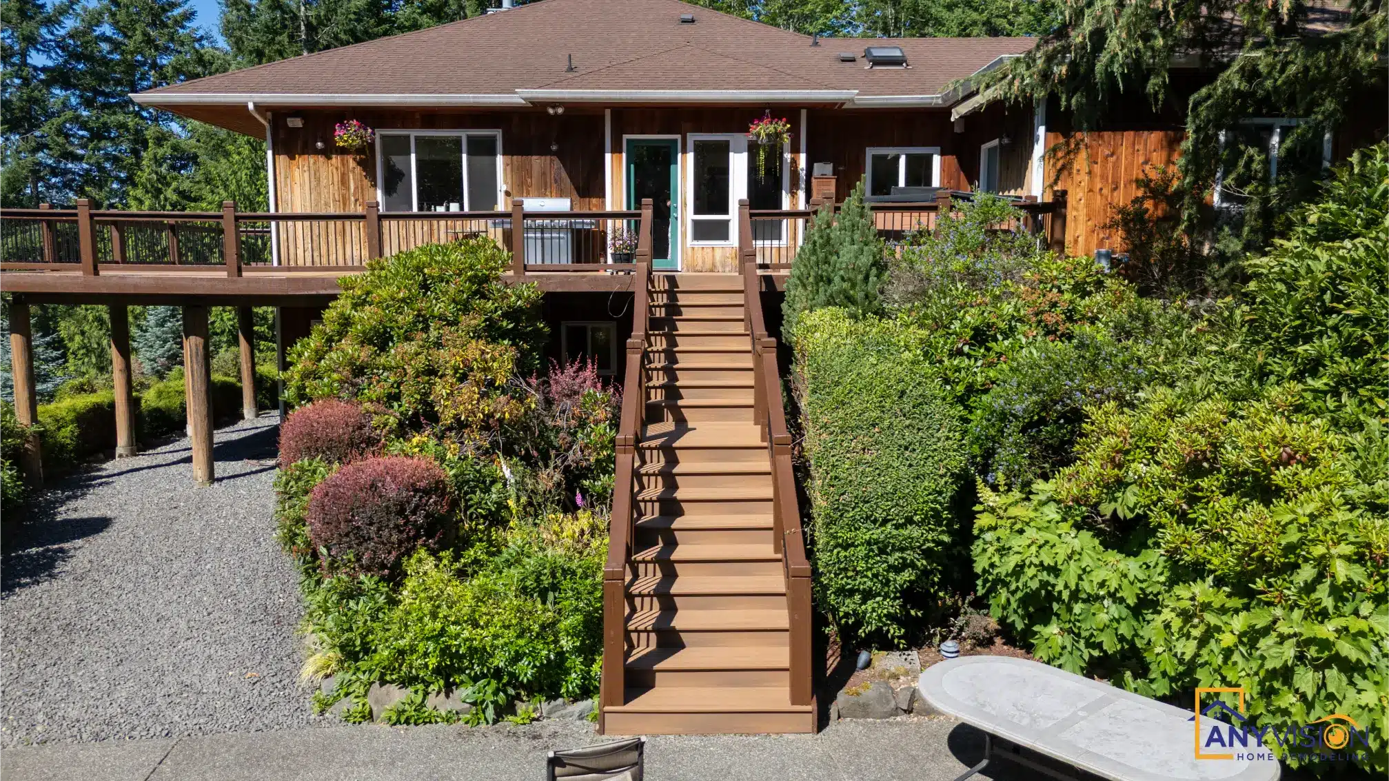 Stair run rising through mature planting to the entry level