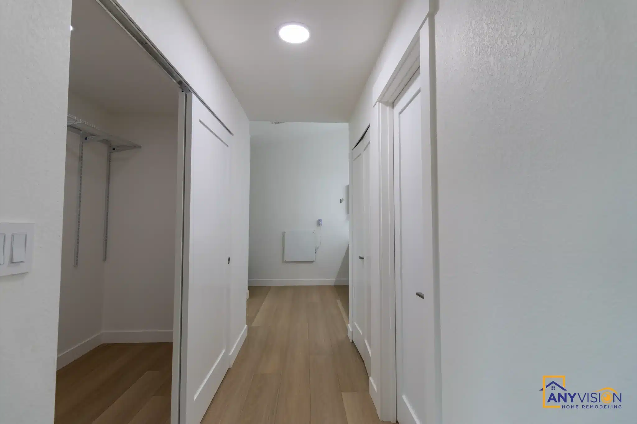 Hallway with fitted closets