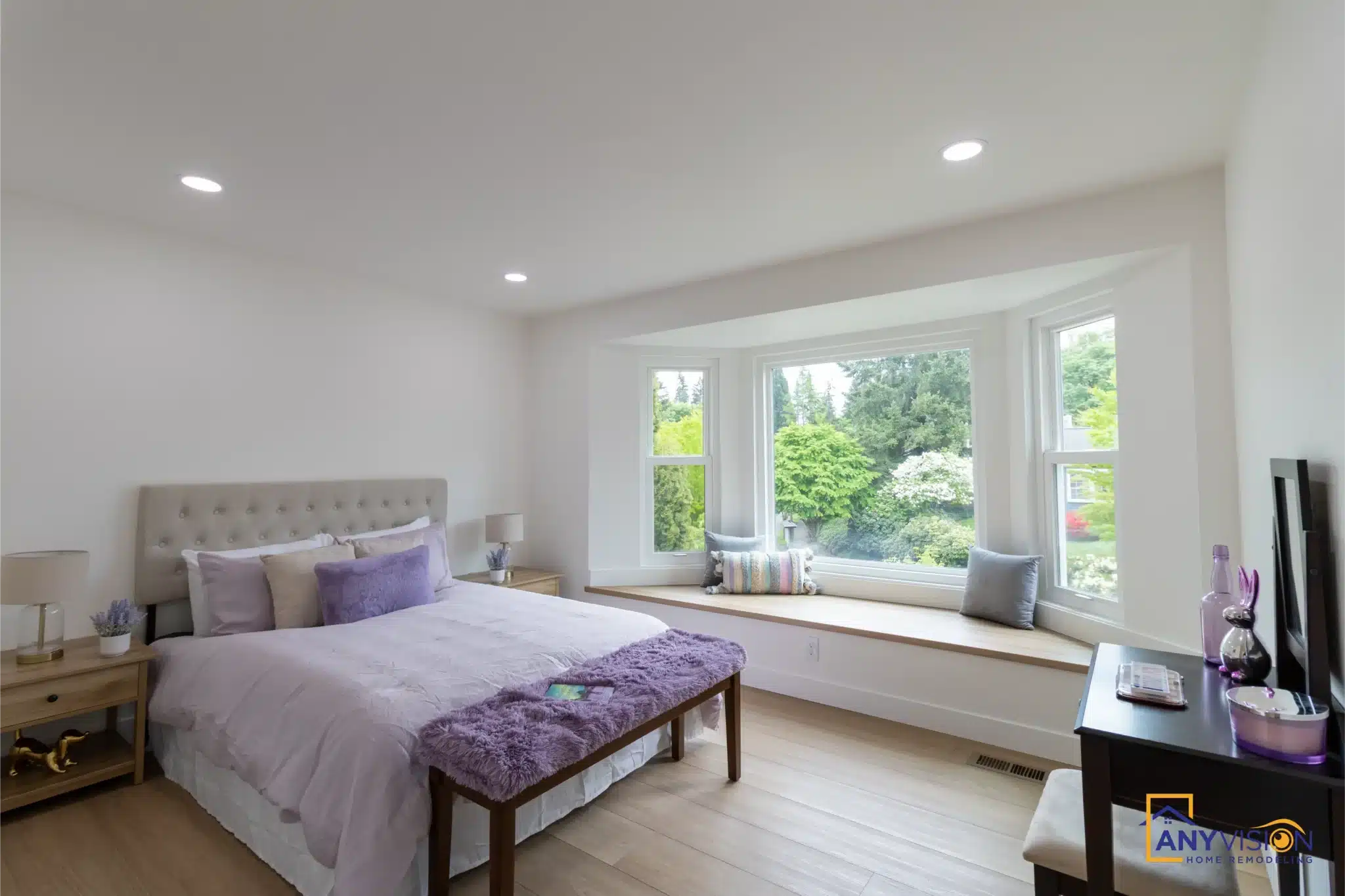 Bedroom with window seat and garden outlook