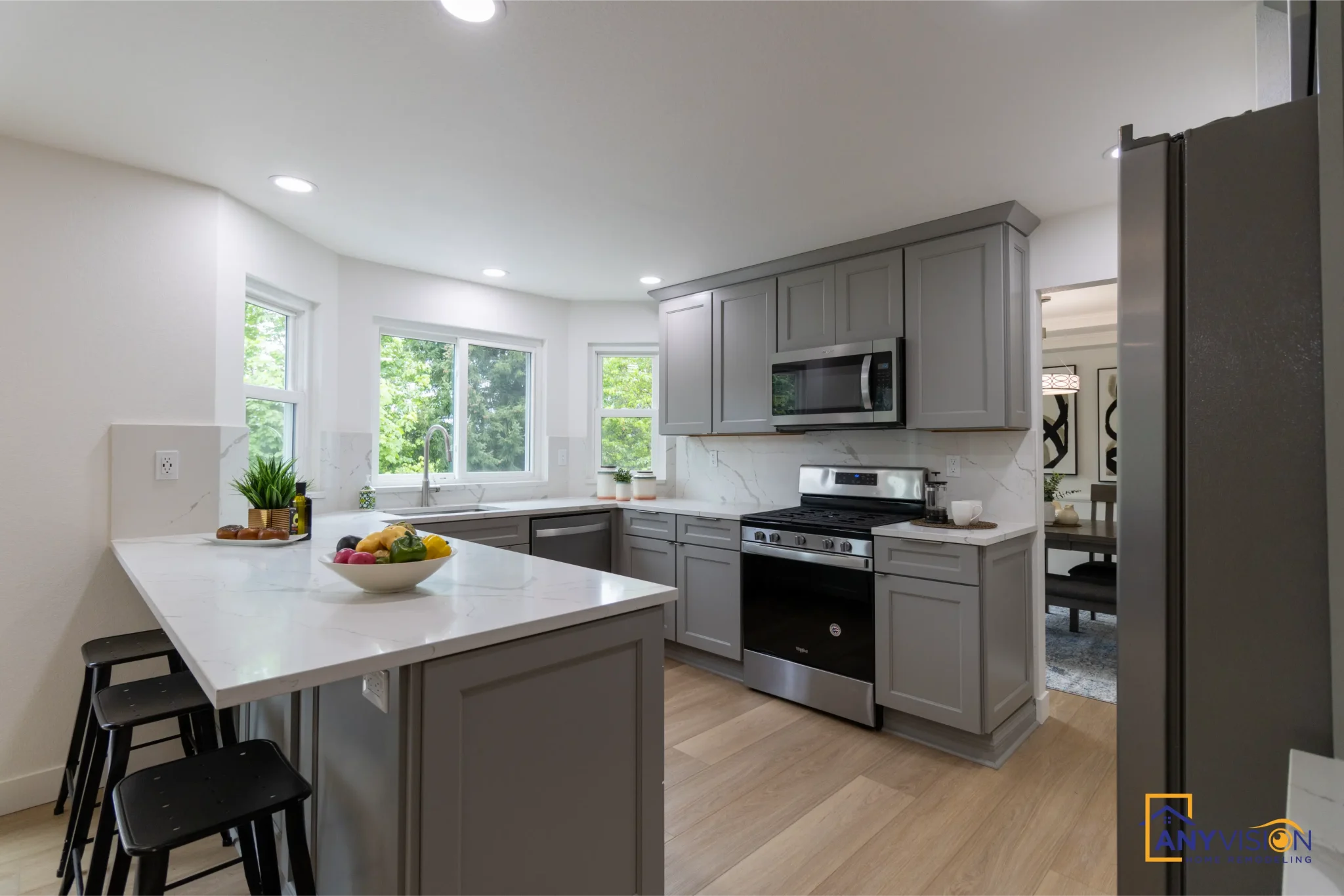 Remodelled kitchen with quartz island and shaker cabinetry, Bothell