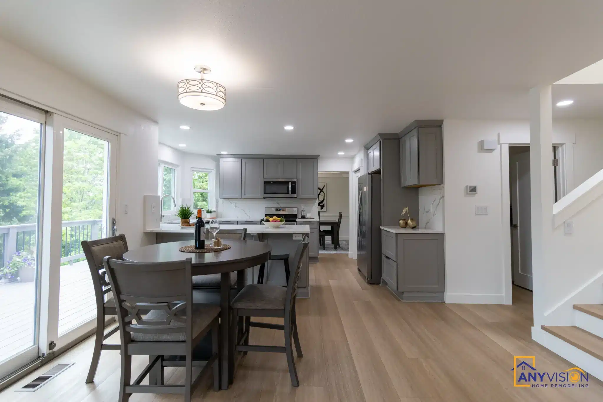 Open-plan kitchen and dining area with sliding doors to the garden