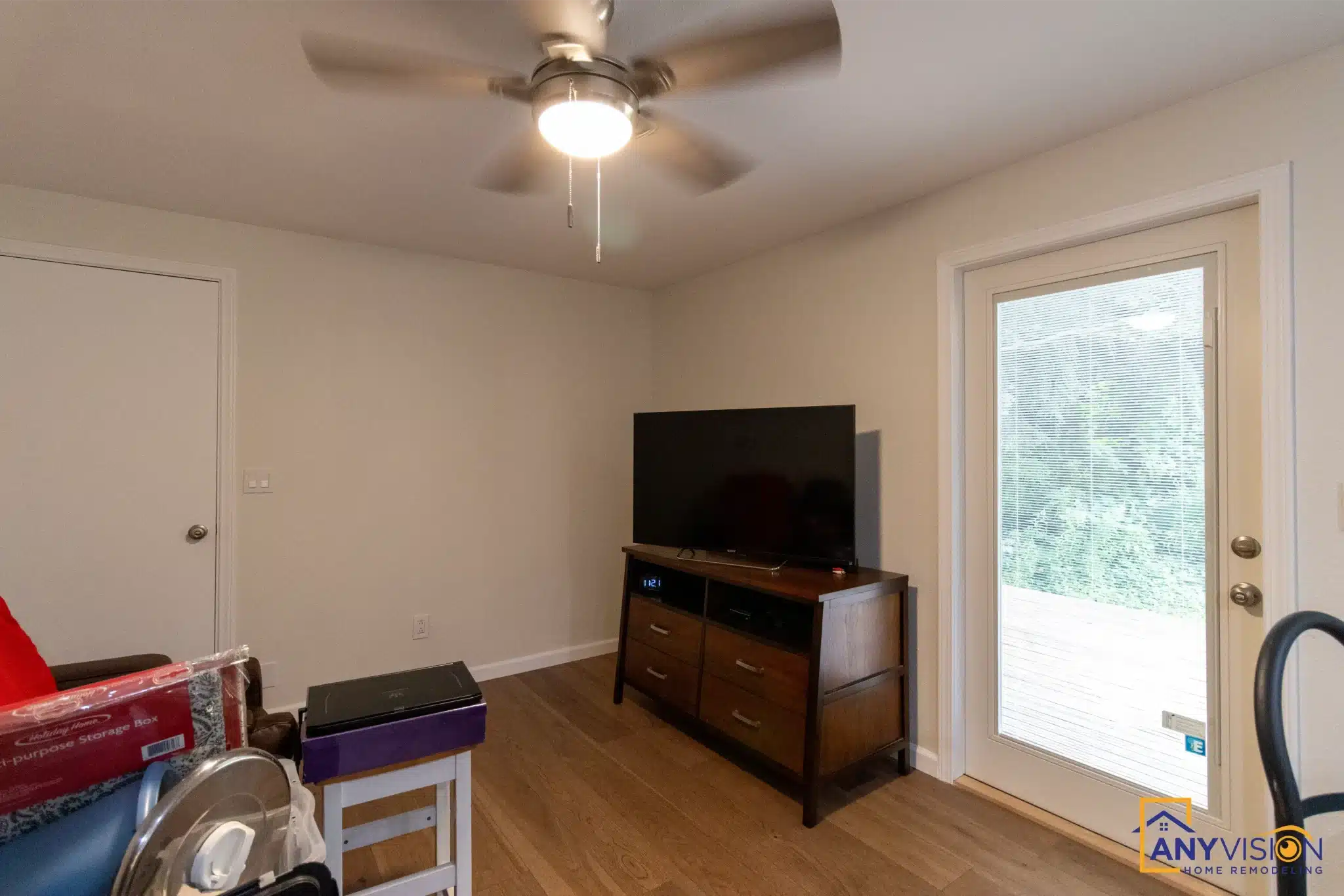 Living space adjoining the kitchen, with the flooring running through
