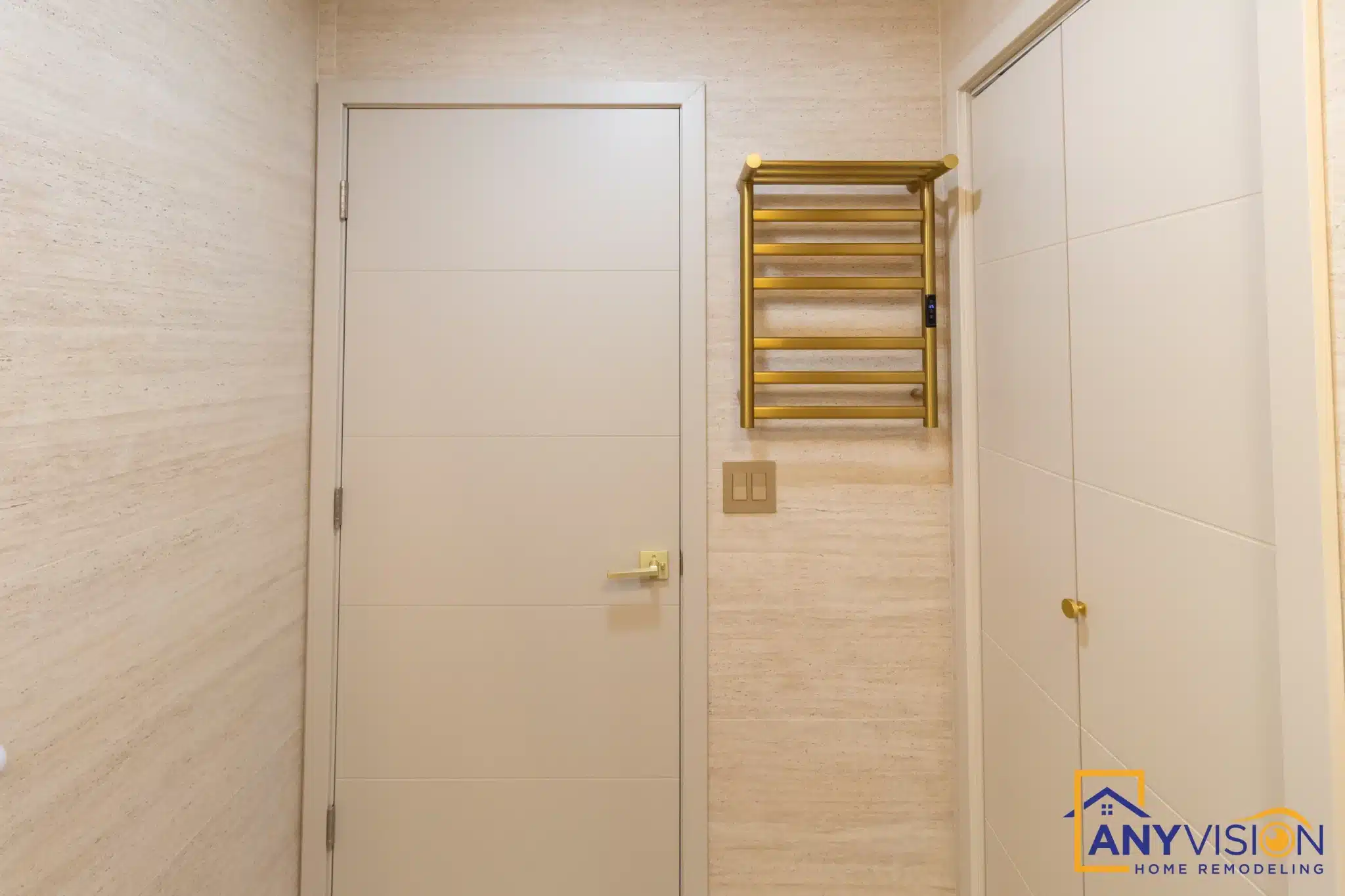 Heated towel rail beside the ensuite door