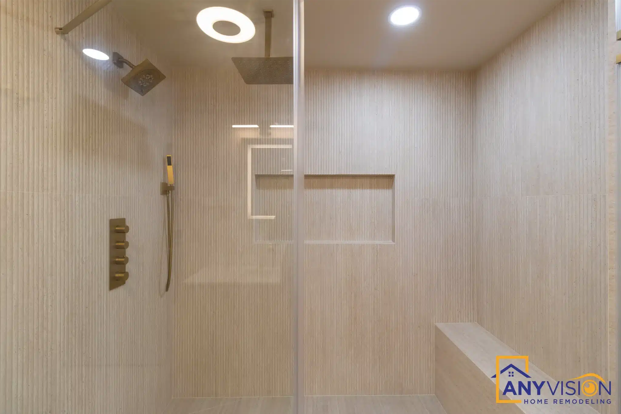 Walk-in shower with rainfall head, bench and fluted tile