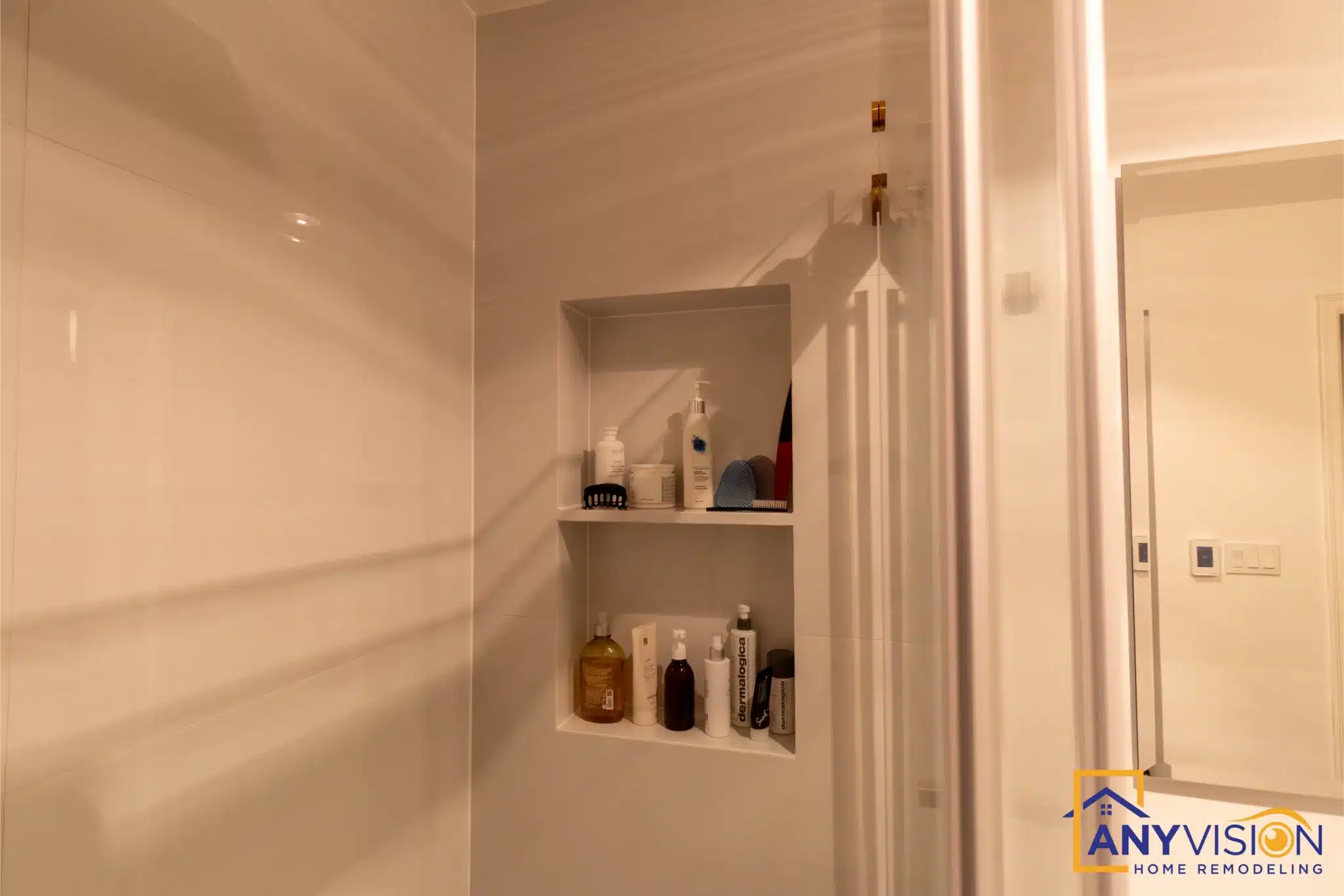 Recessed shelving set into the hallway wall