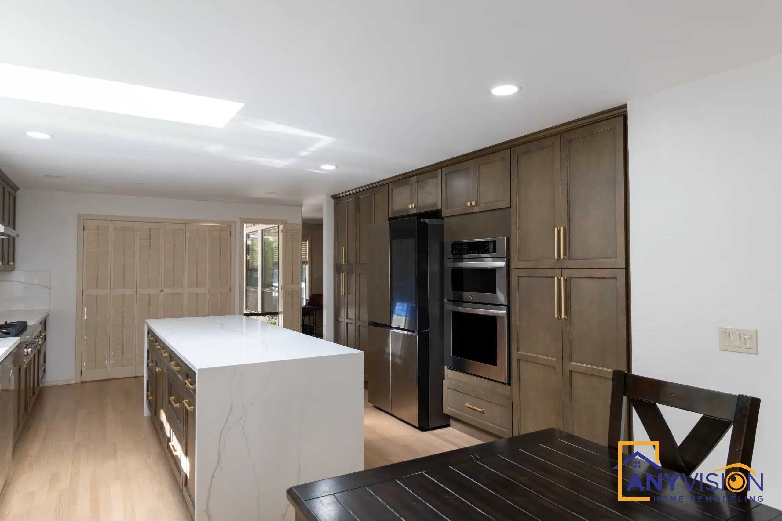 Custom kitchen with quartz island and full-height cabinetry permitted and built under WA Lic #ANYVIHR768KB