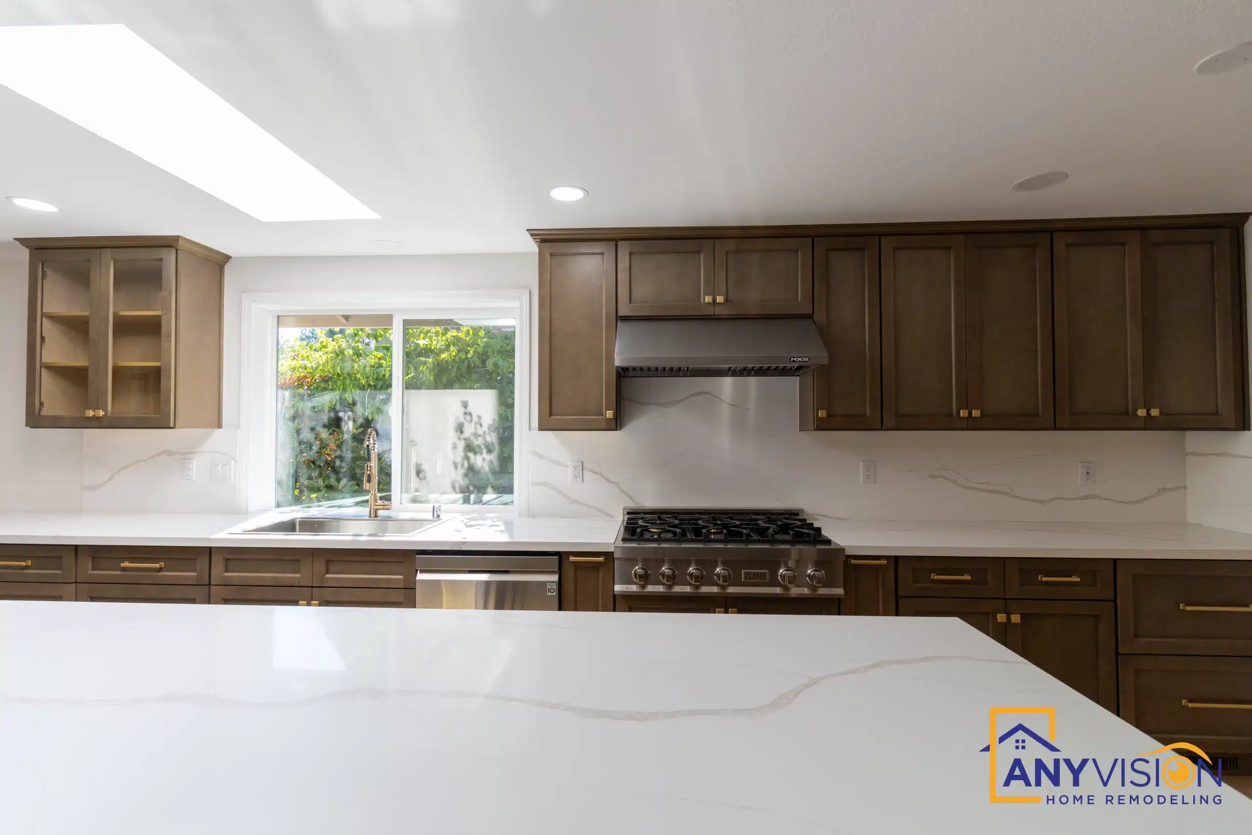 Range wall with a quartz backsplash and a window above the cooktop