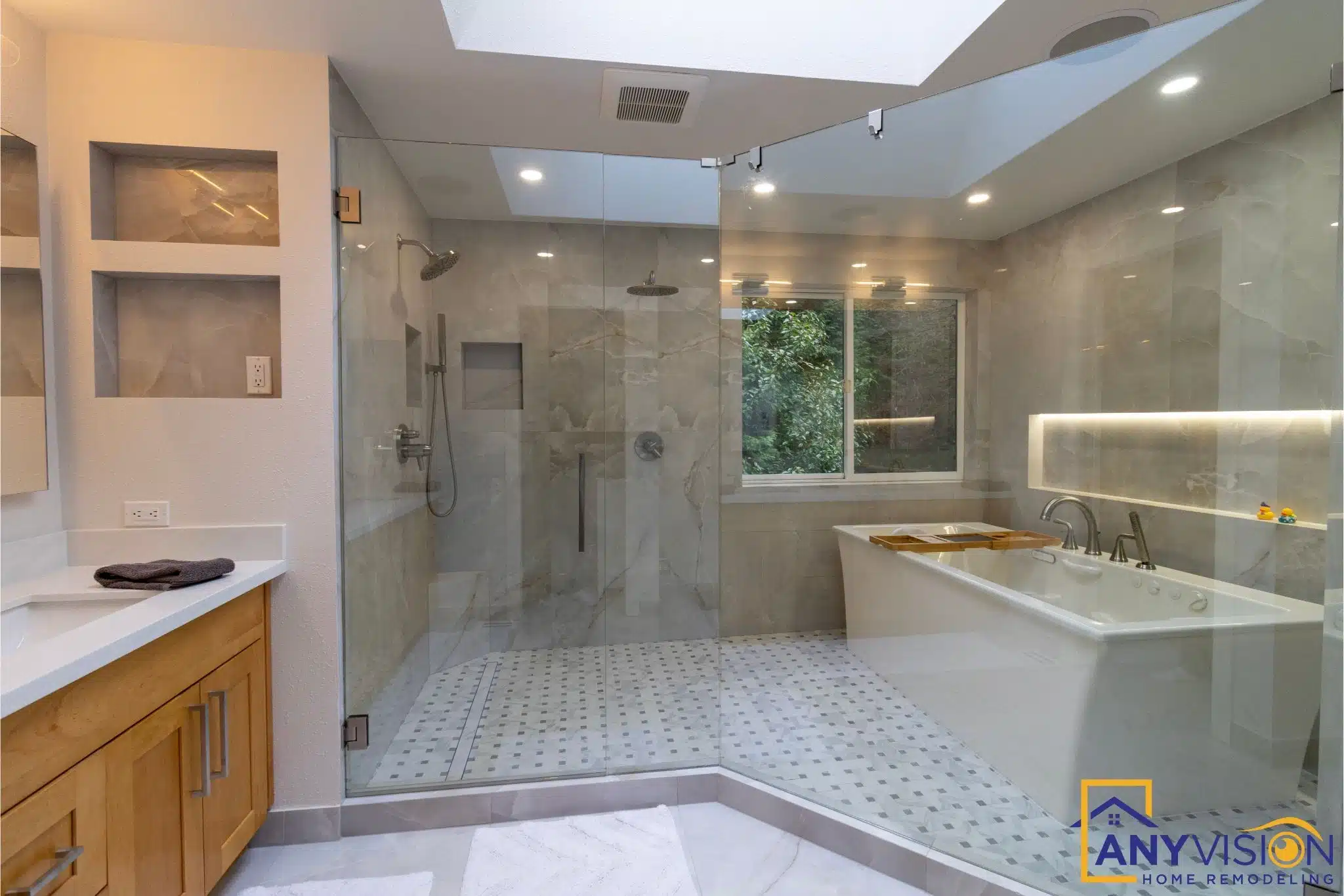 Shower enclosure with the soaking tub and window beyond