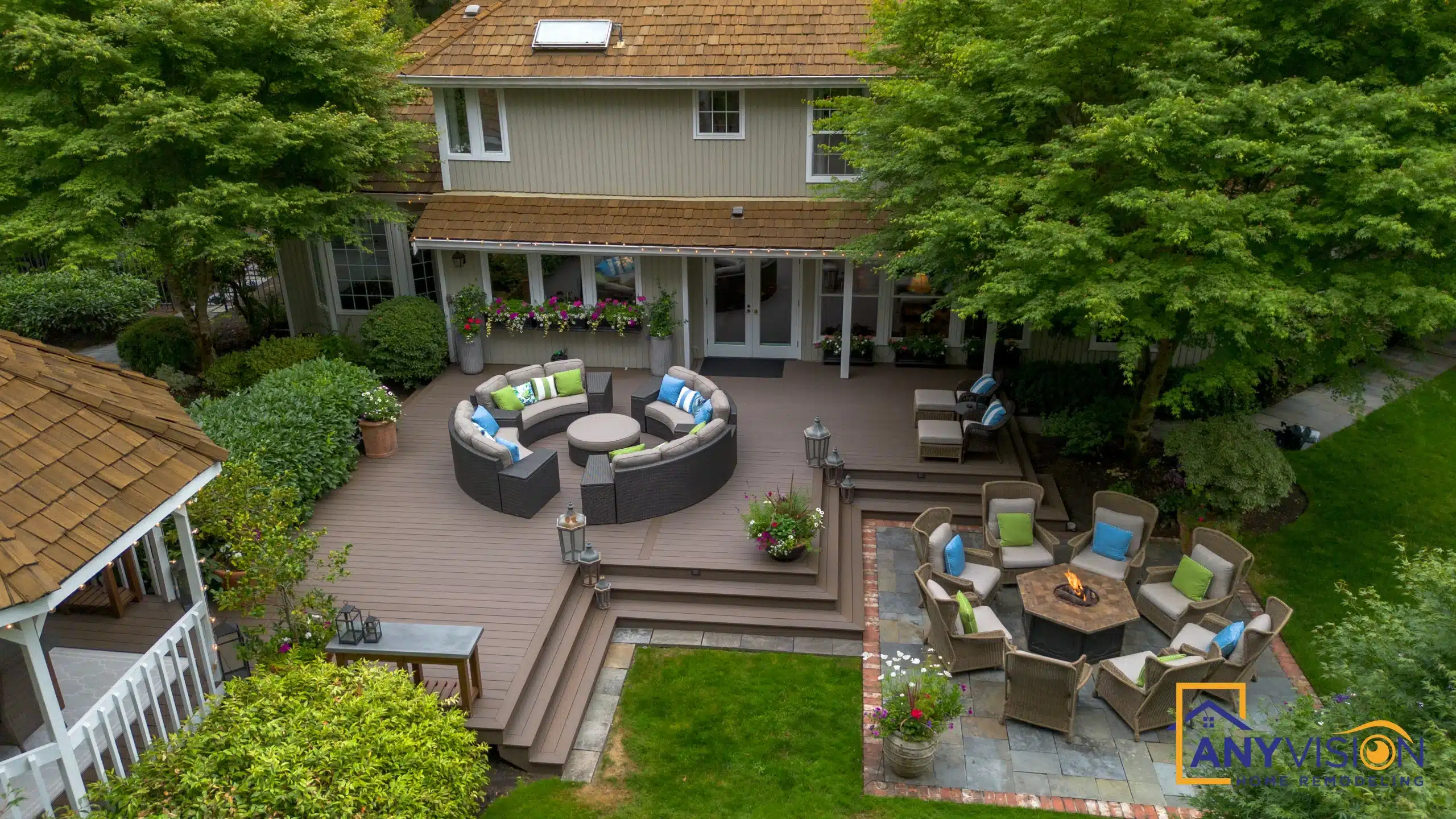 Elevated view across the deck terraces and the surrounding lawn