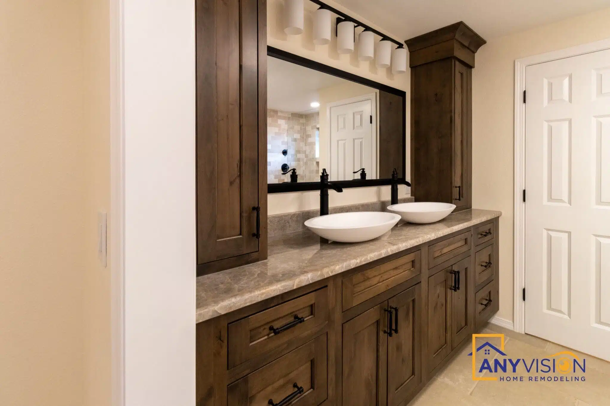 Vanity detail with undermount basin and matte black tap