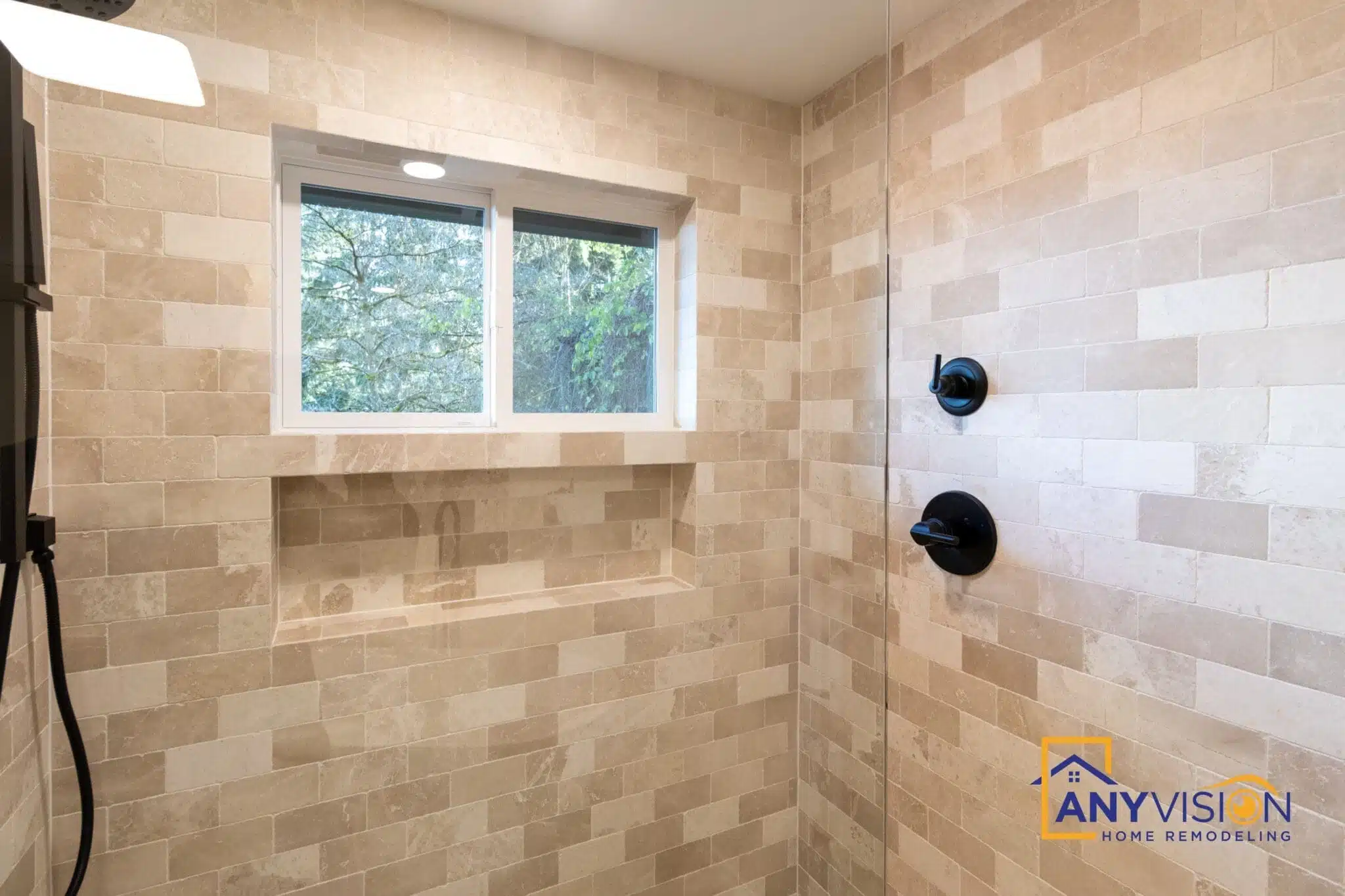 Shower area with two windows and matte black hardware