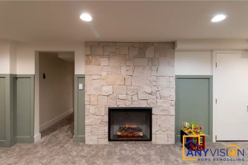 Custom stone fireplace and millwork in a Seattle basement conversion