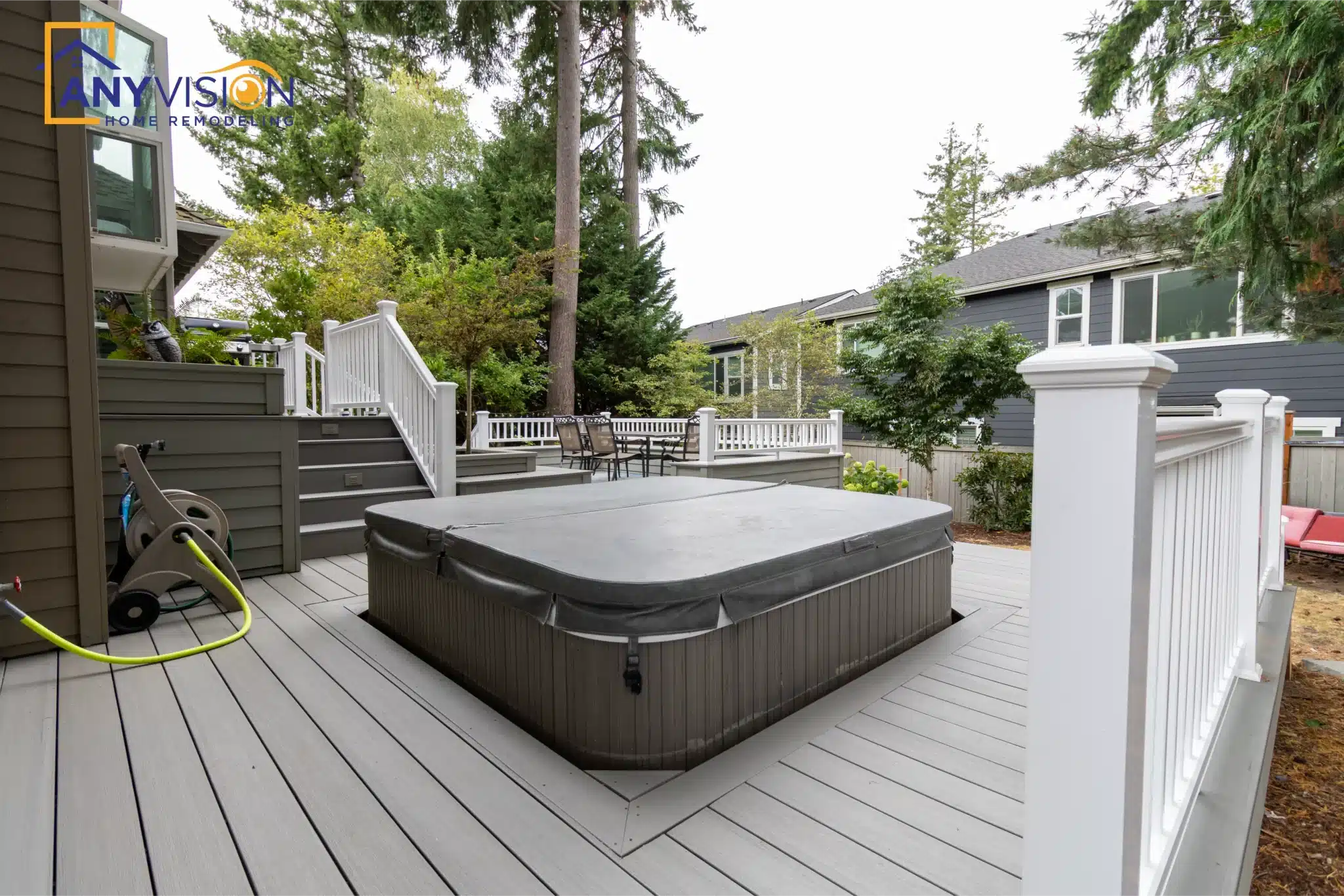 Hot tub set on its own deck terrace with privacy screening