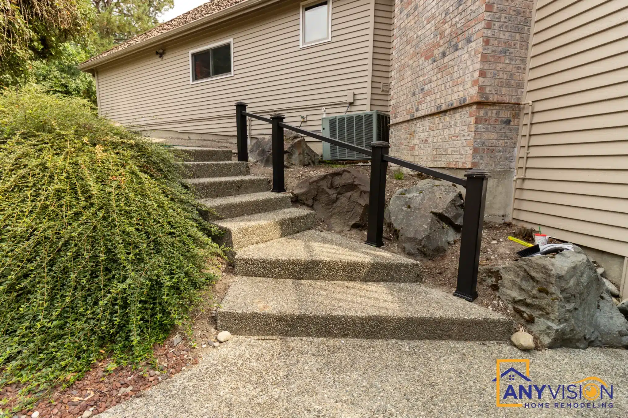 Side path and steps rising to the deck level