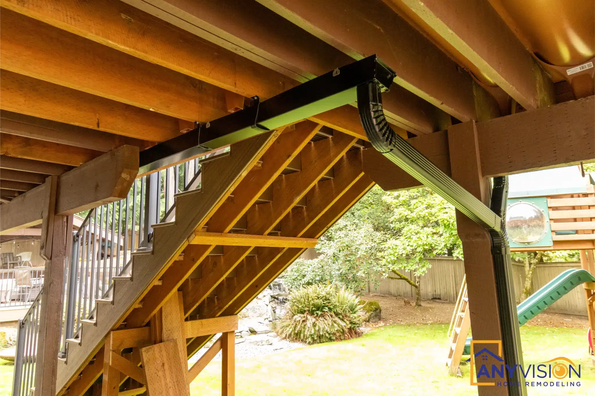 View beneath the deck showing beams, posts and framing