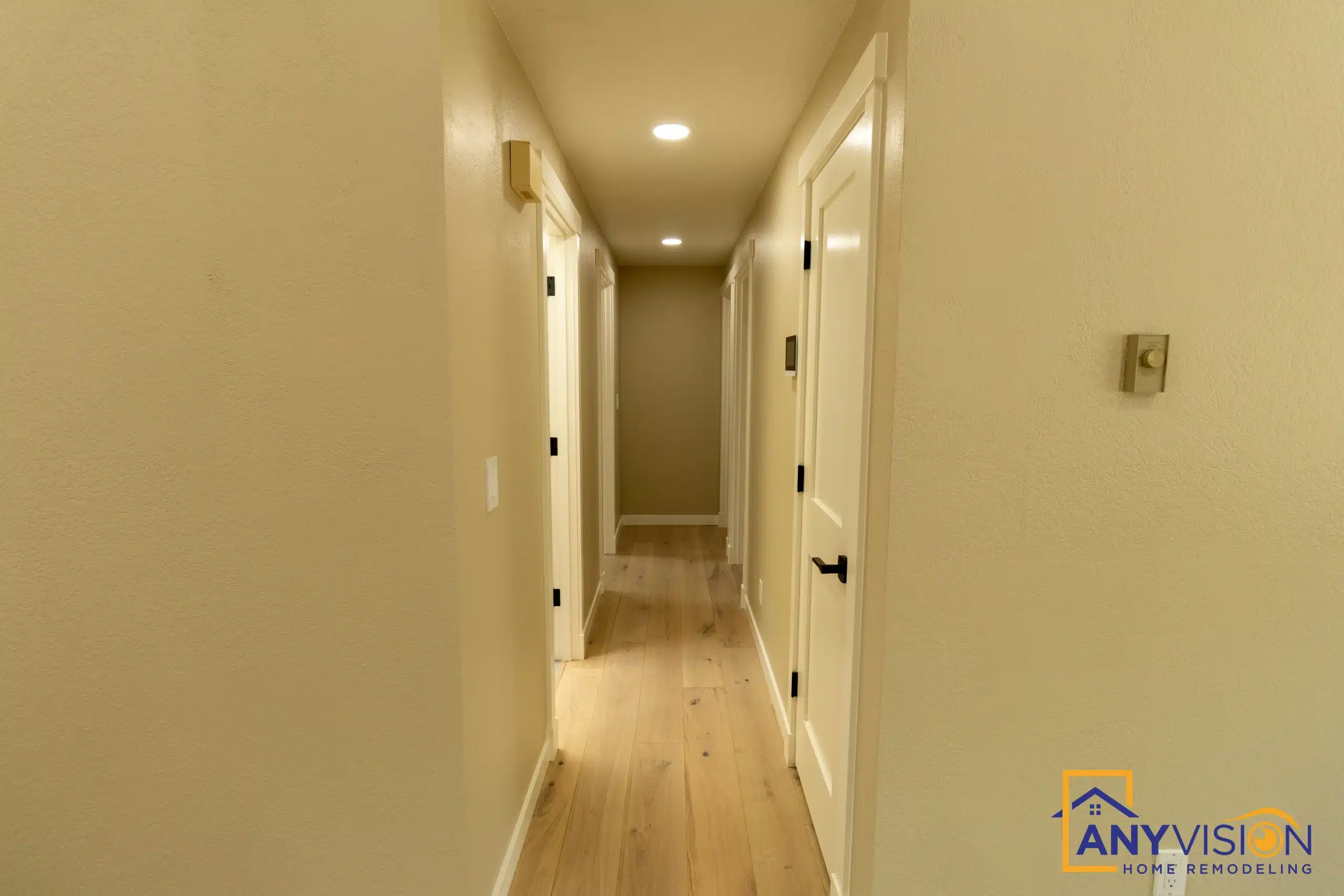 Hallway connecting the renovated bedrooms and bathrooms