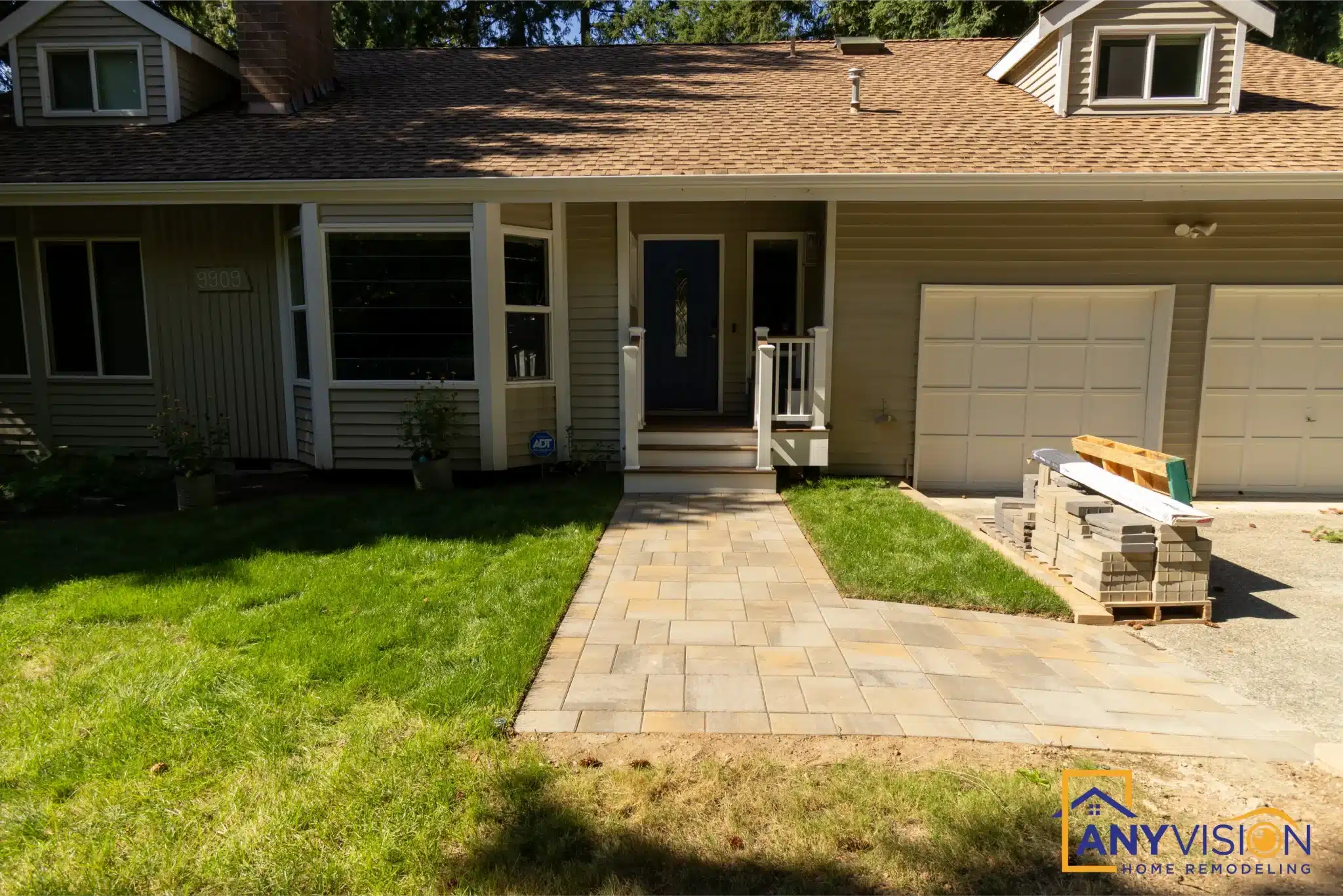 Front elevation with the completed walkway and lawn