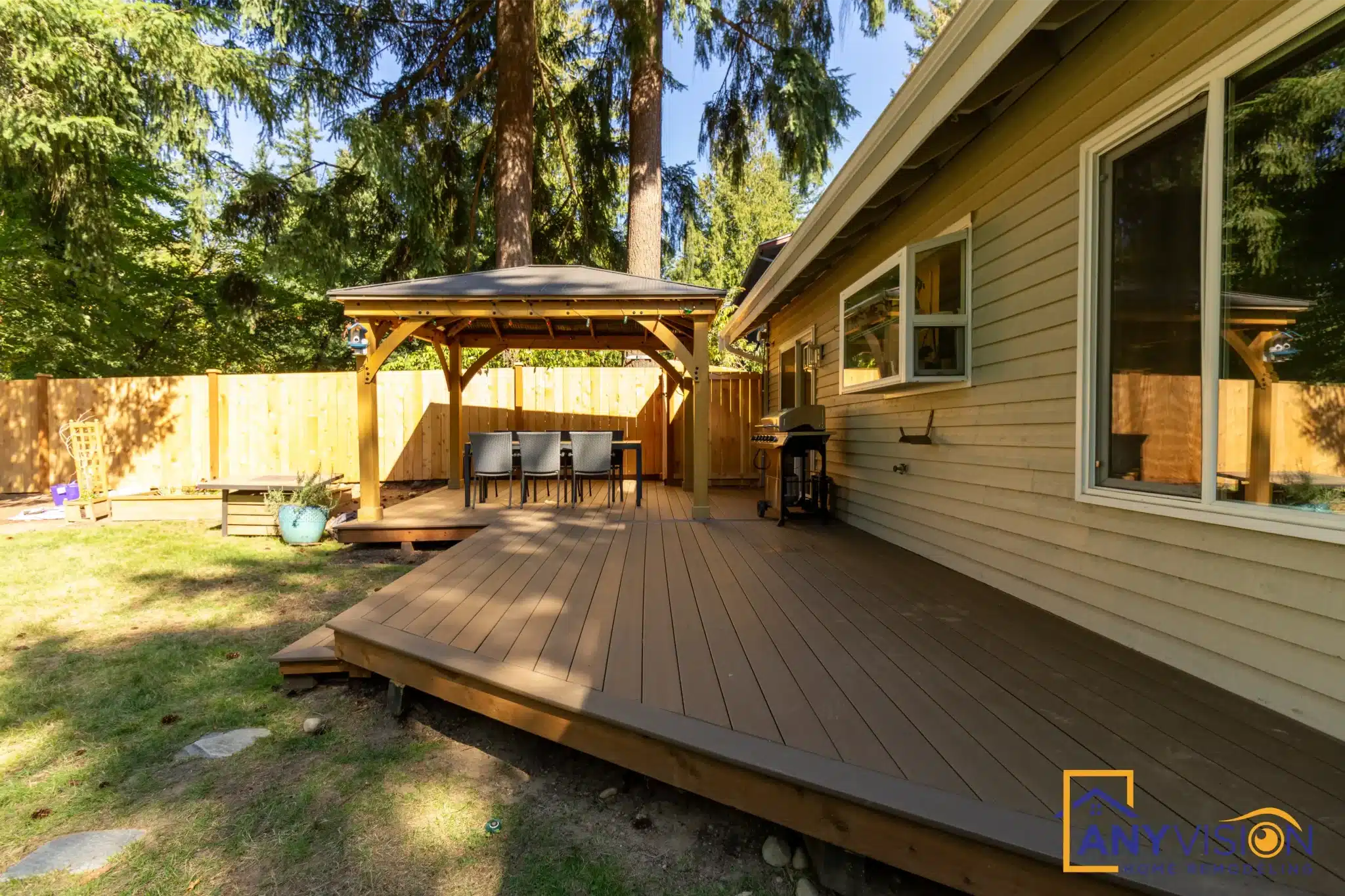 Side view of the deck showing the stepped edge down to the lawn