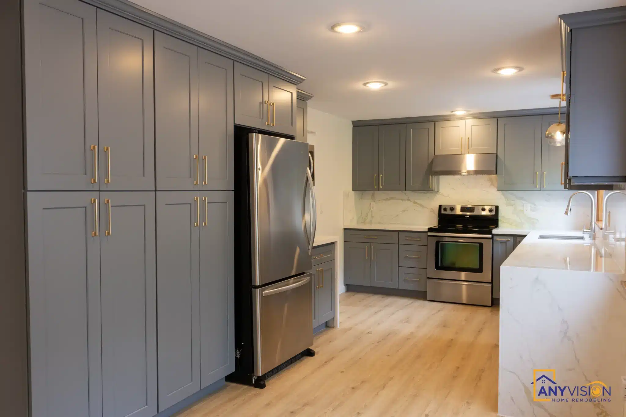 Galley kitchen with grey shaker cabinetry and quartz counters, Bothell WA