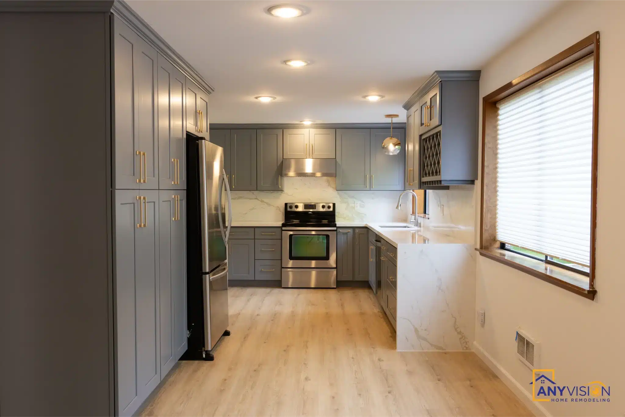 Full length of the kitchen with the refrigerator bank