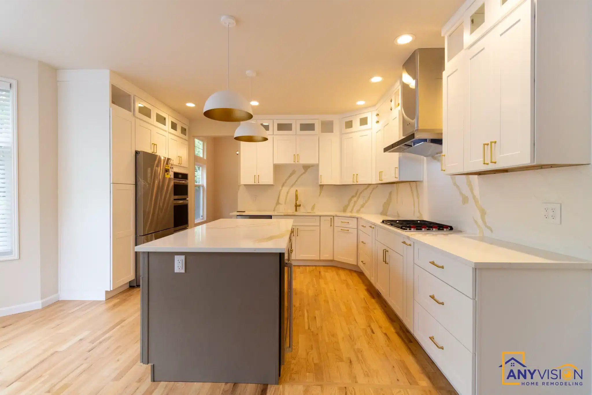 Kitchen seen down its length with the vaulted ceiling above
