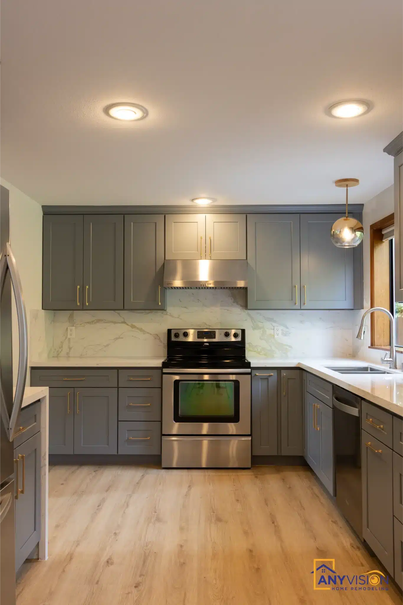 Finished kitchen with pendants over the peninsula