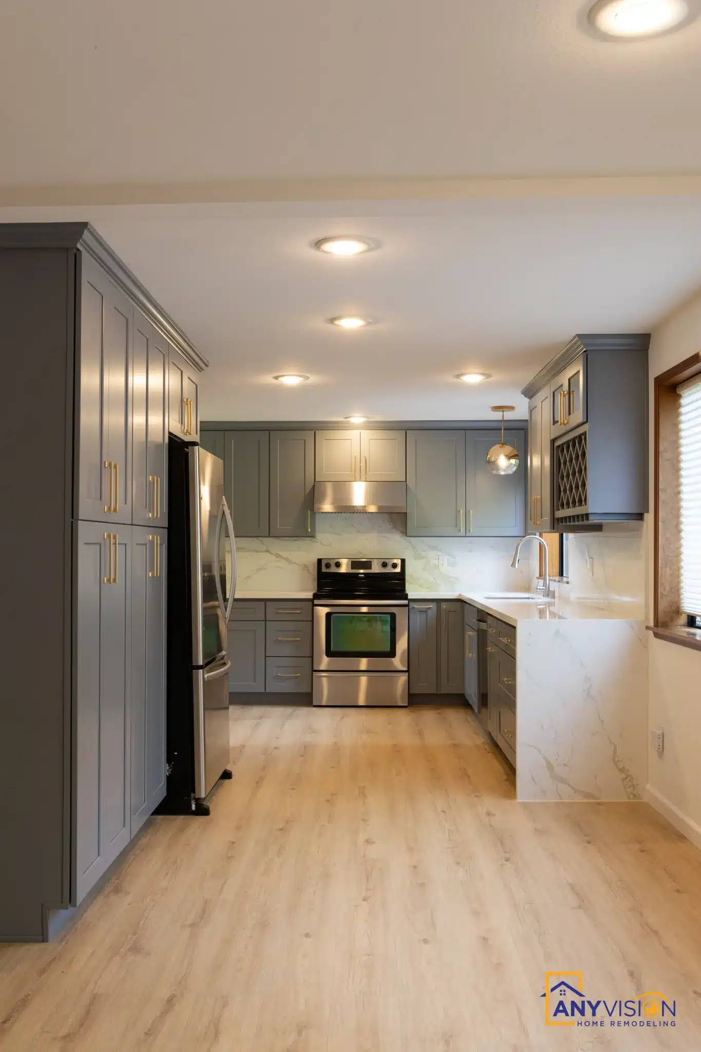 View down the length of the finished kitchen toward the window