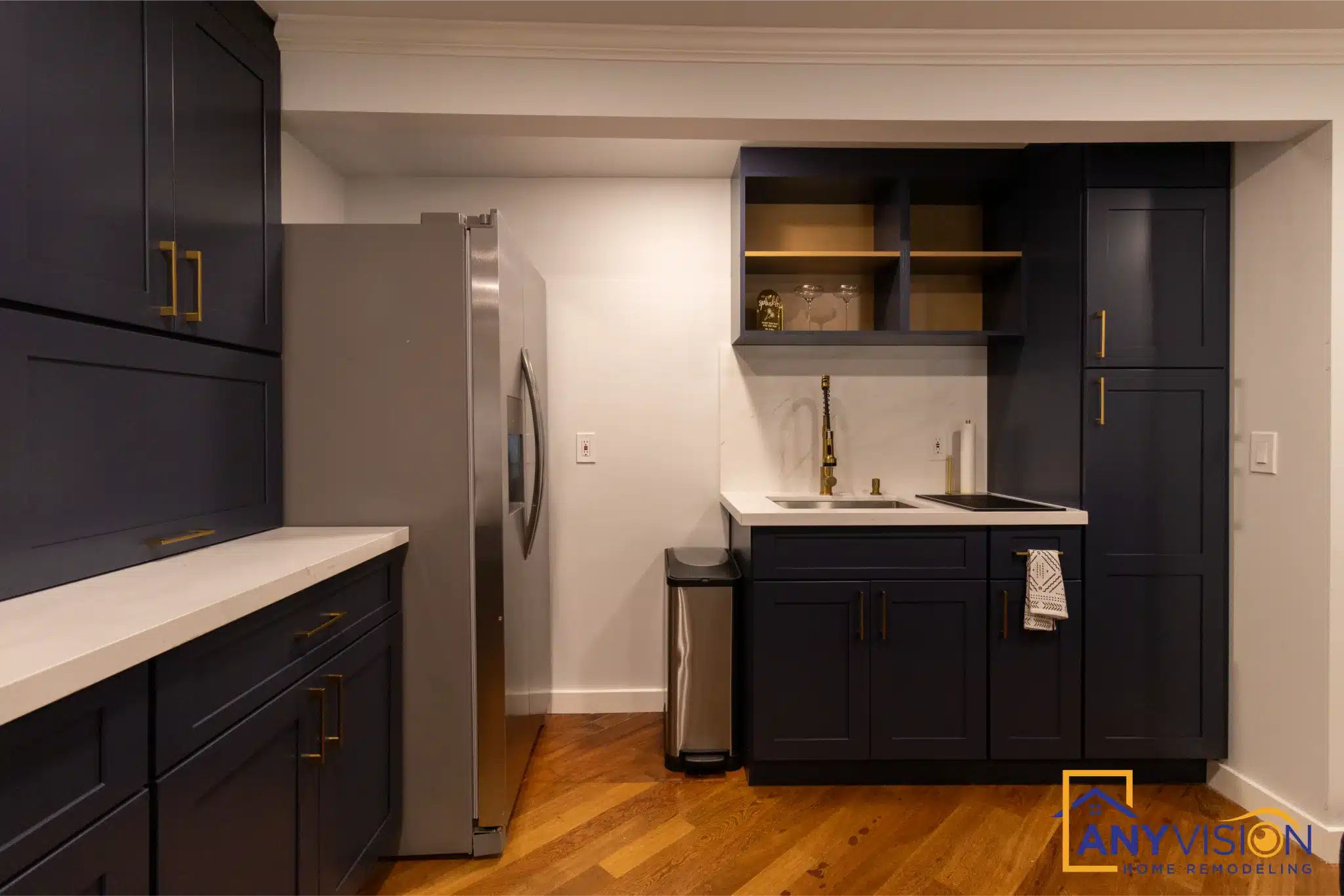 Kitchenette run with under-counter refrigeration and open shelving above