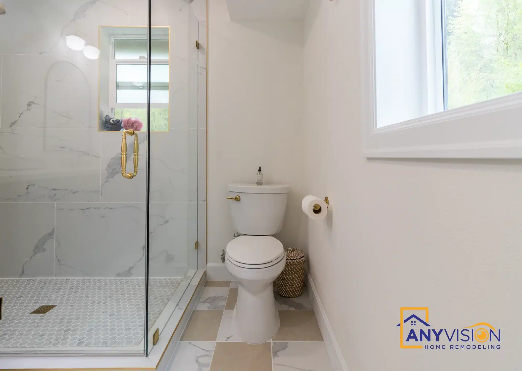 WC and shower area with hex tile floor and marble-look slab walls