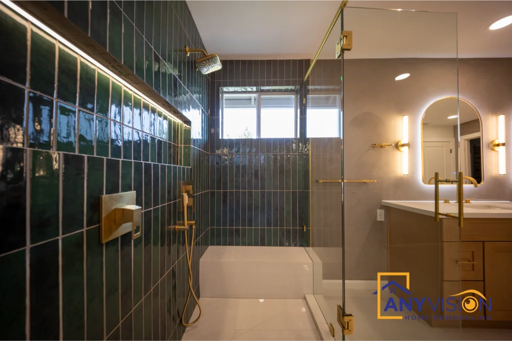 Vertically stacked green tile running full height beside the bath