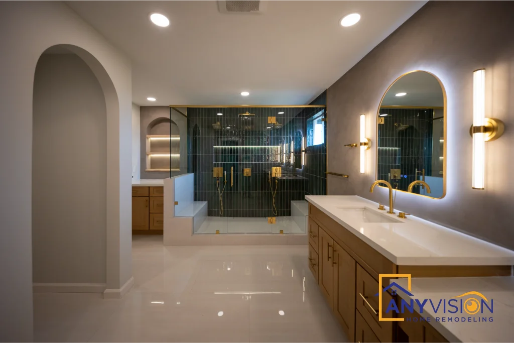 Primary bathroom with arched mirrors and dark green tile by Anyvision