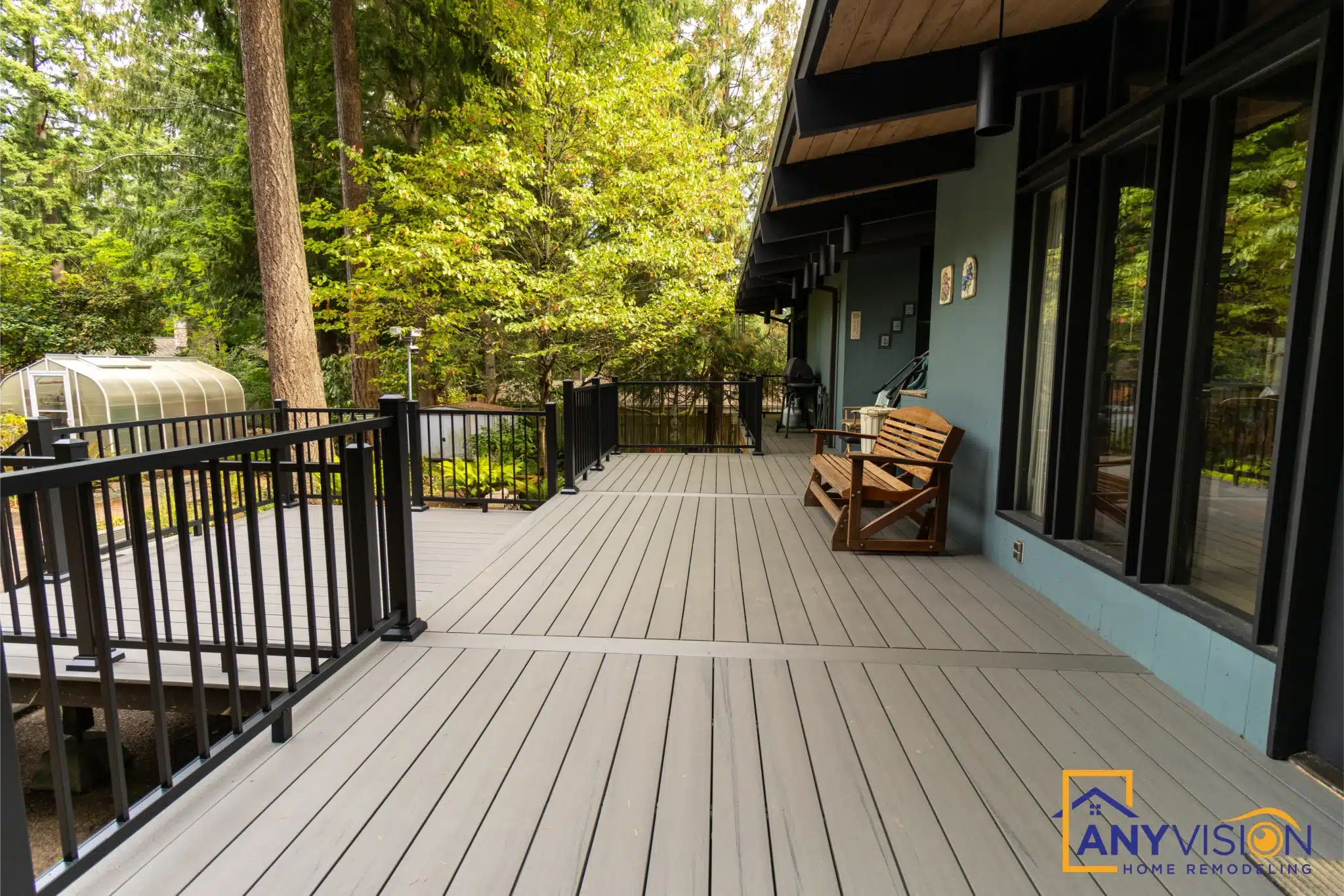 Corner of the covered deck where the roof structure meets the house wall
