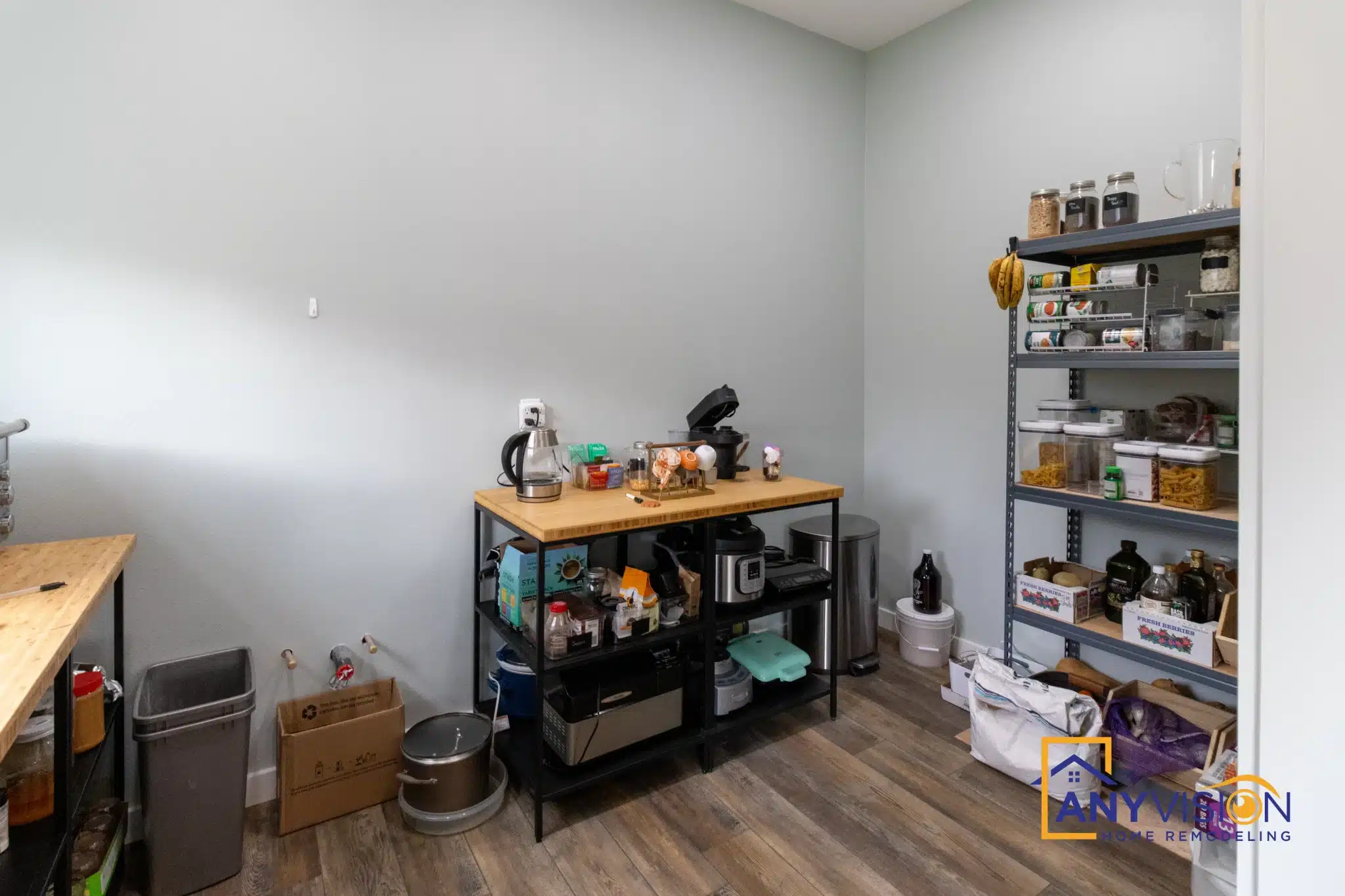 Walk-in pantry with open shelving off the kitchen