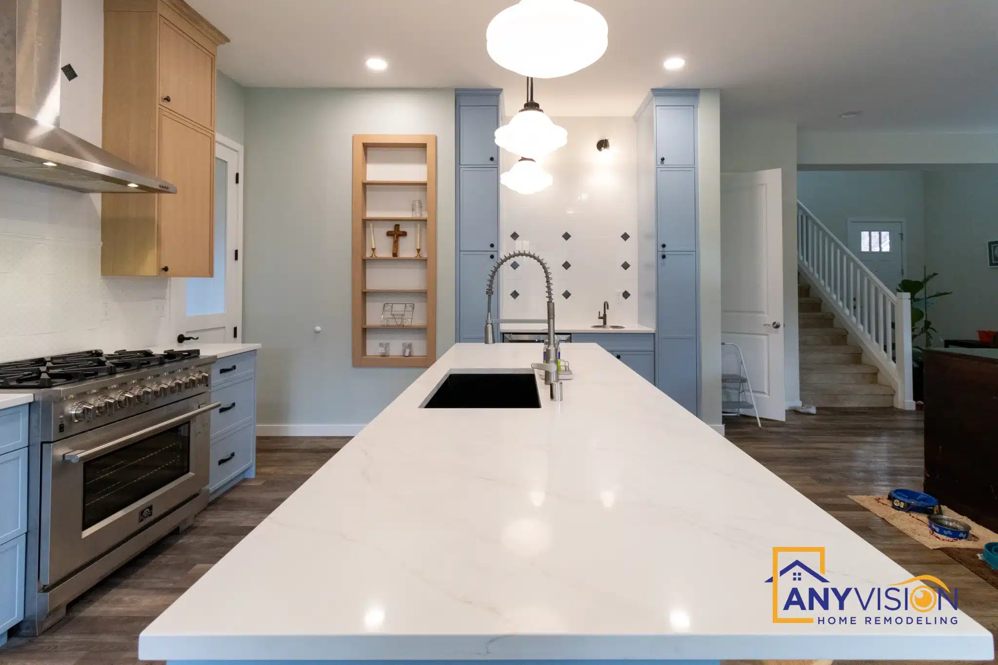Kitchen with wood cabinetry and a large island, completed by Anyvision in Lake Stevens