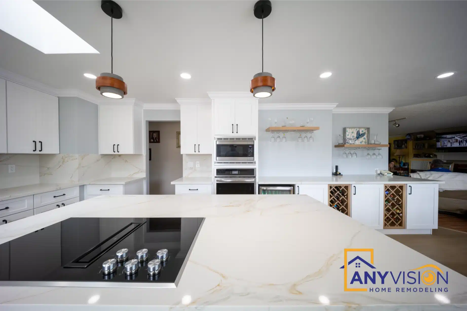 Island counter and cooktop with the veining running across the surface