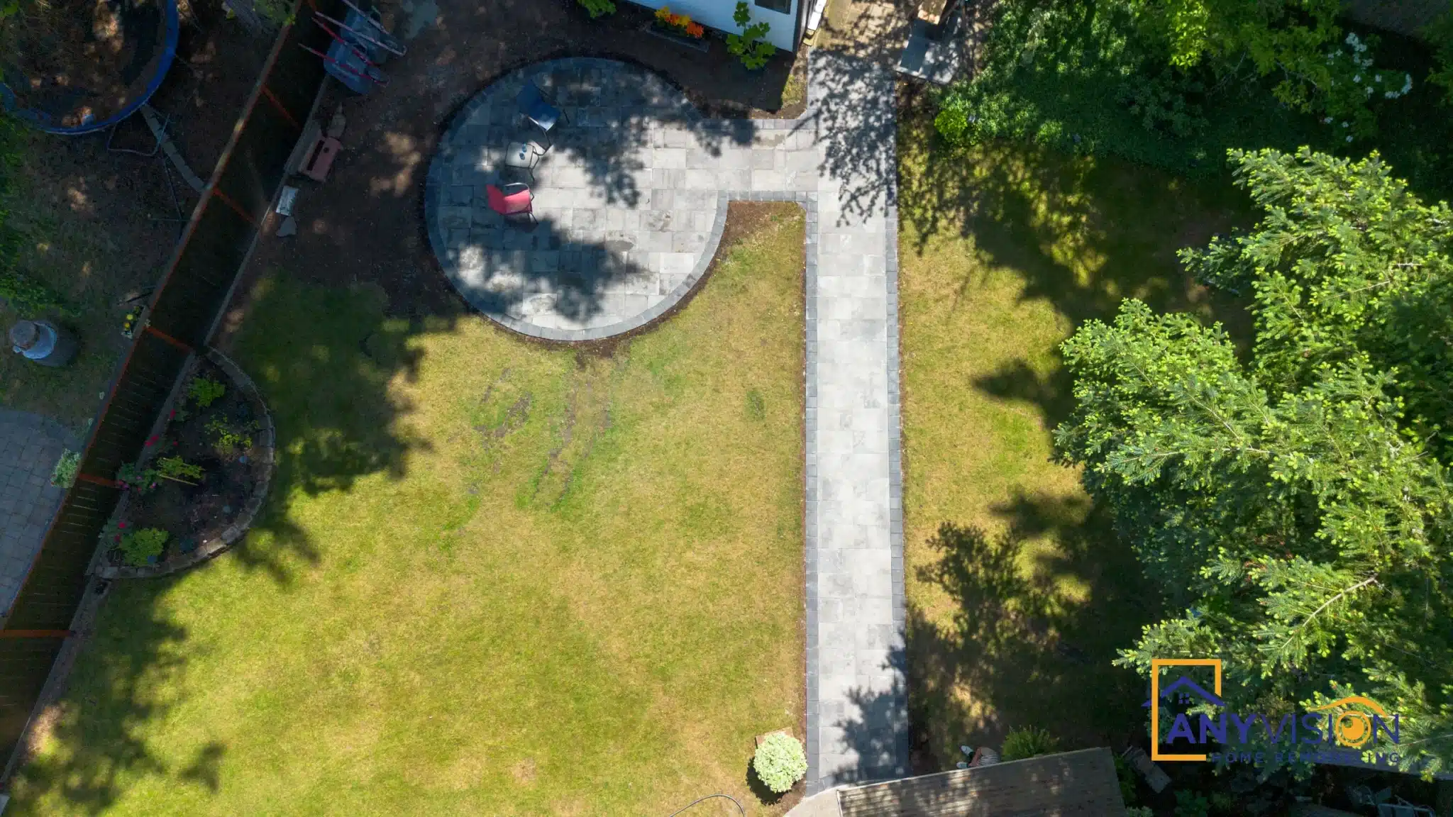 Overhead view of the circular patio and the walkway running back to the house