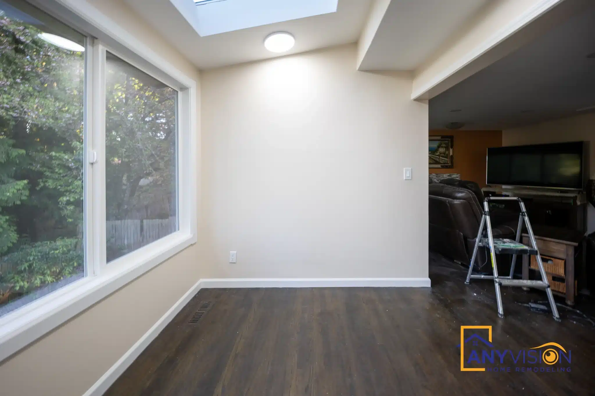 Sunroom with windows on three sides before furnishing