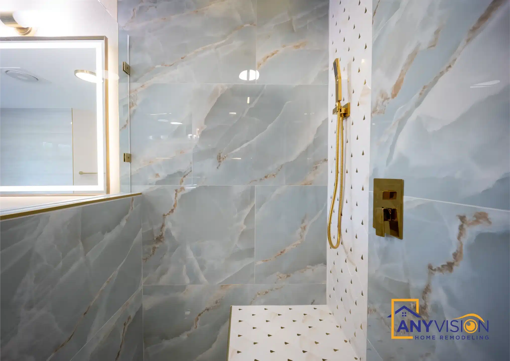 Shower controls and handheld against the slab wall