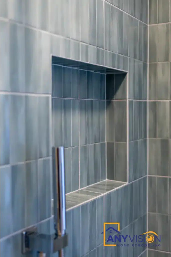 Recessed niche set into the tiled shower wall