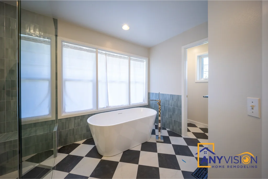 Tub and checkerboard floor from the room entrance