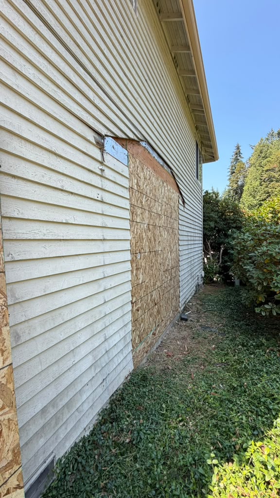 Existing siding on the Redmond split-level before the addition ties in