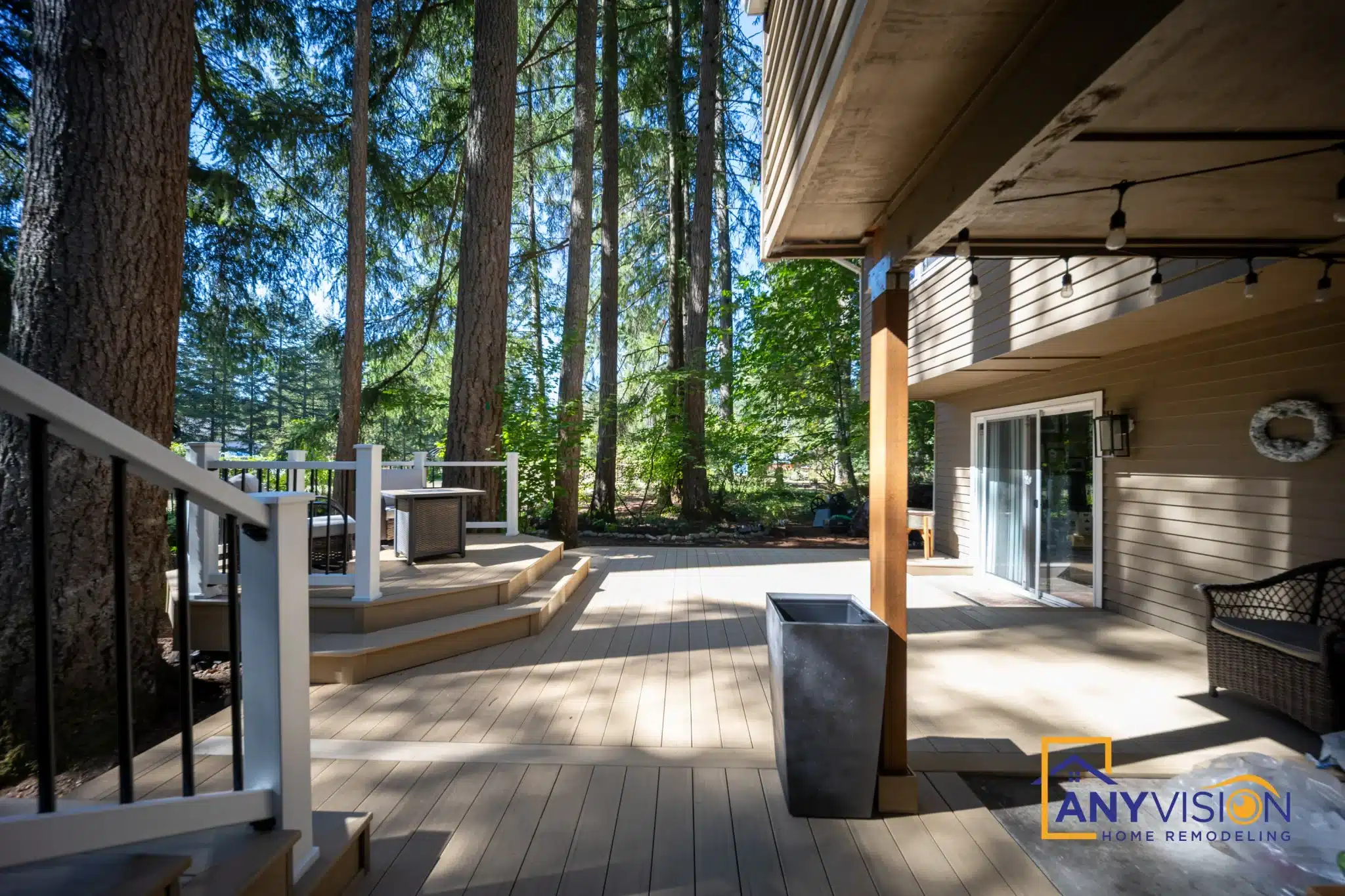 Deck area sheltered beneath the upper storey of the house