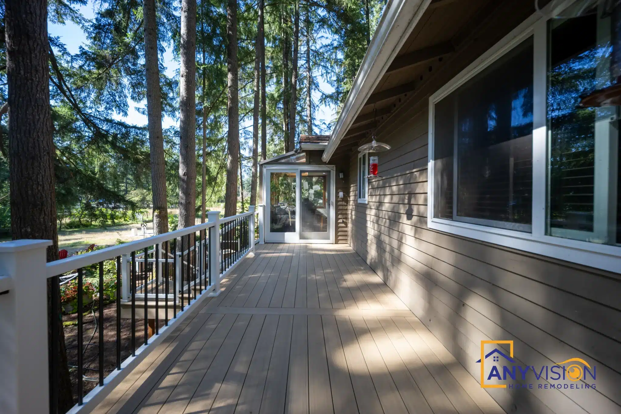 Wrap-around deck walkway running the length of the rear elevation