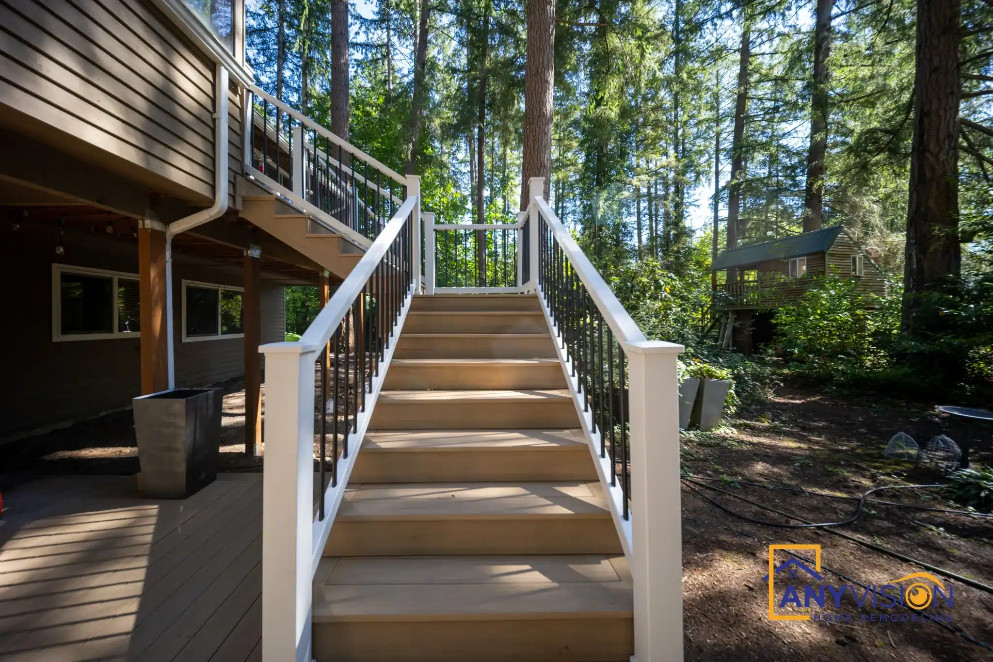 Permitted multi-level deck with a long stair run on a sloping Redmond lot