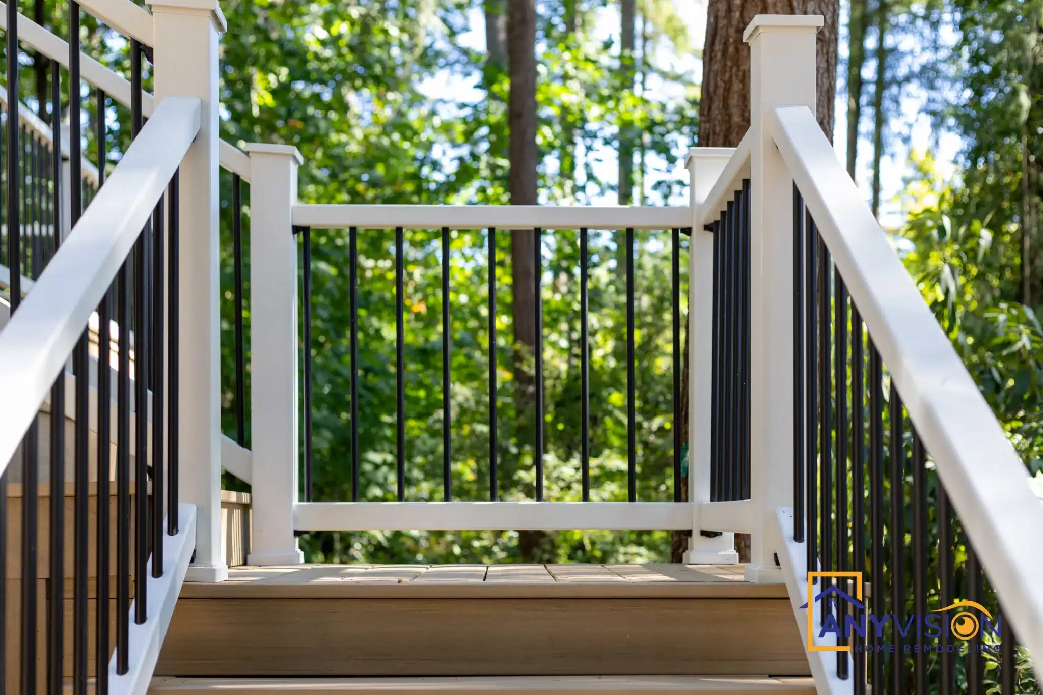 Guard rail and baluster detail looking out into the trees