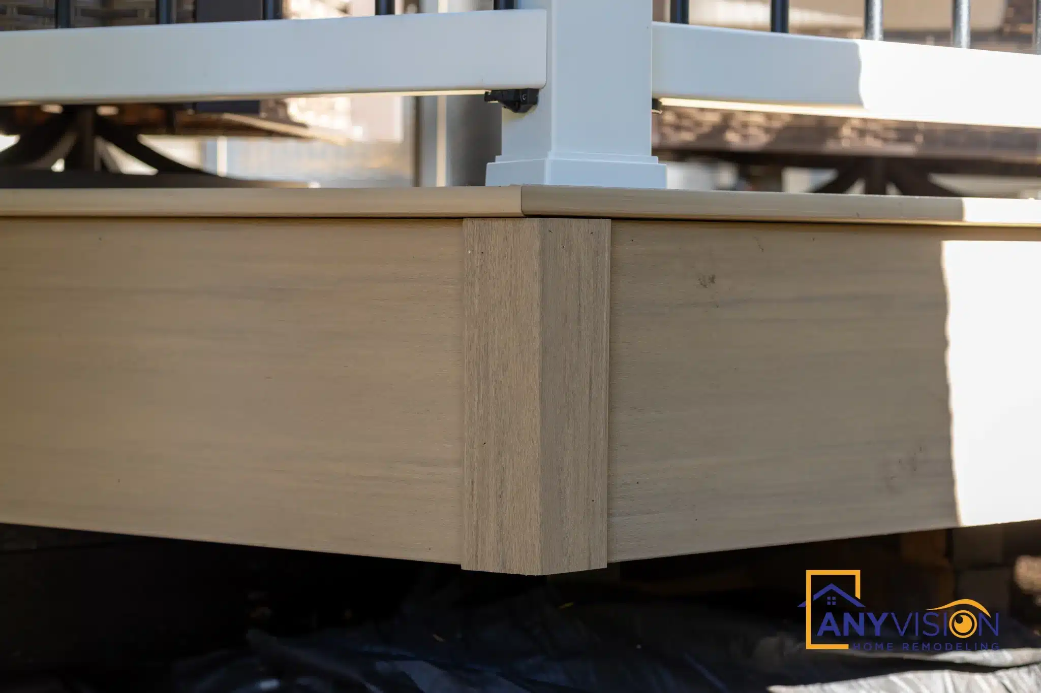 Skirting and framing detail beneath the deck edge