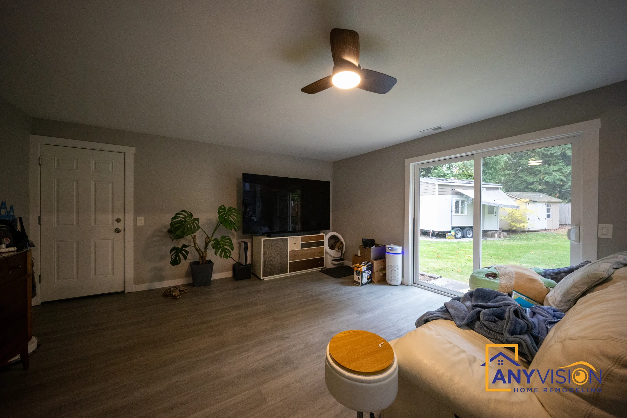 Adjoining living room with sliding doors to the backyard